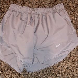 All grey Nike running shorts
